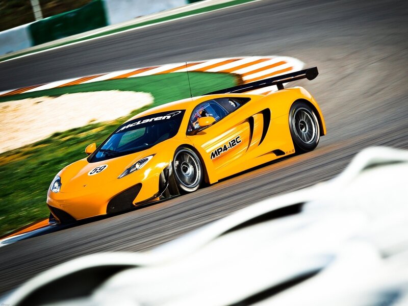 Yellow McLaren on racetrack