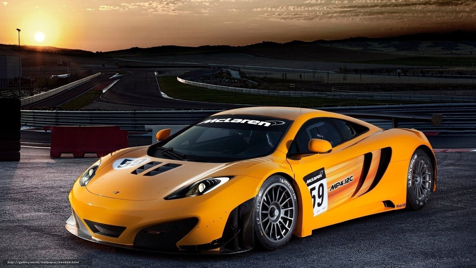 Yellow McLaren on racetrack
