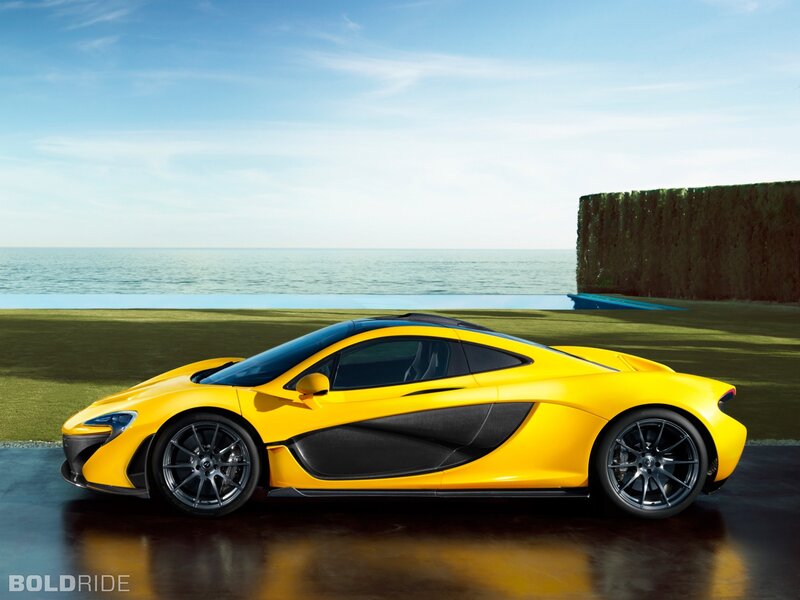 Yellow McLaren P1 by the sea