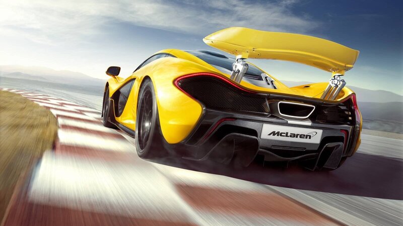 Yellow McLaren P1 on a racetrack