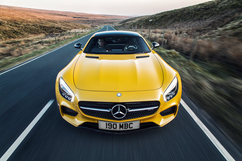 Yellow Mercedes-AMG GT on country road