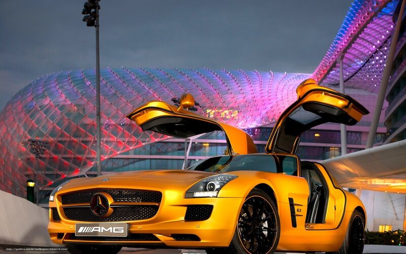 Yellow Mercedes-AMG SLS with doors open
