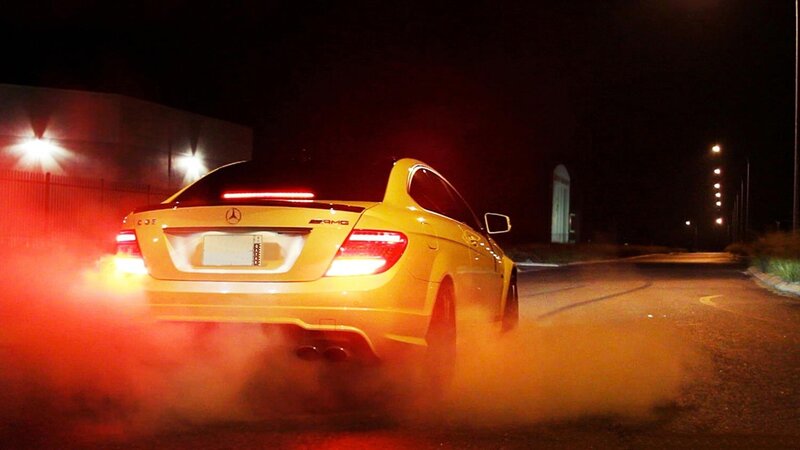 Yellow Mercedes-Benz C63 AMG