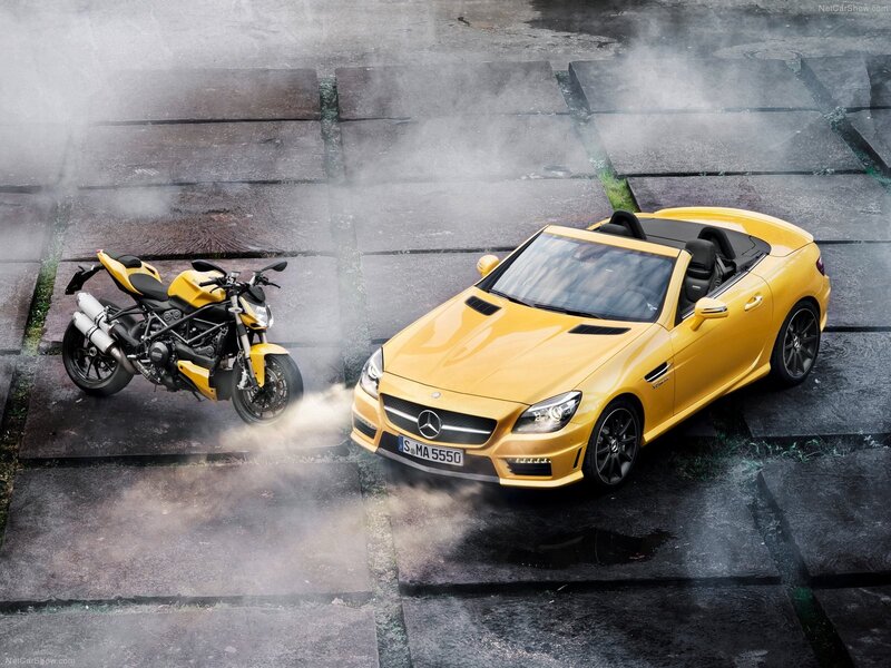 Yellow Mercedes-Benz SLK and Ducati