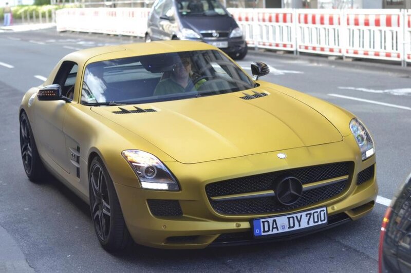 yellow Mercedes-Benz SLS AMG
