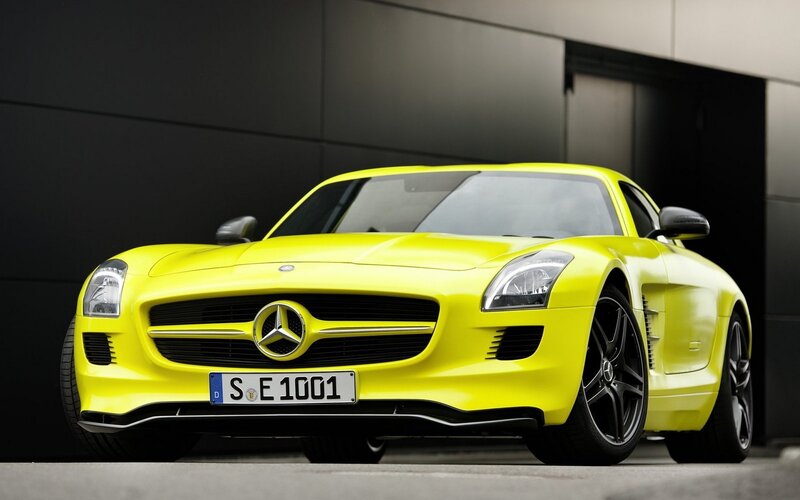 yellow mercedes-benz sports car