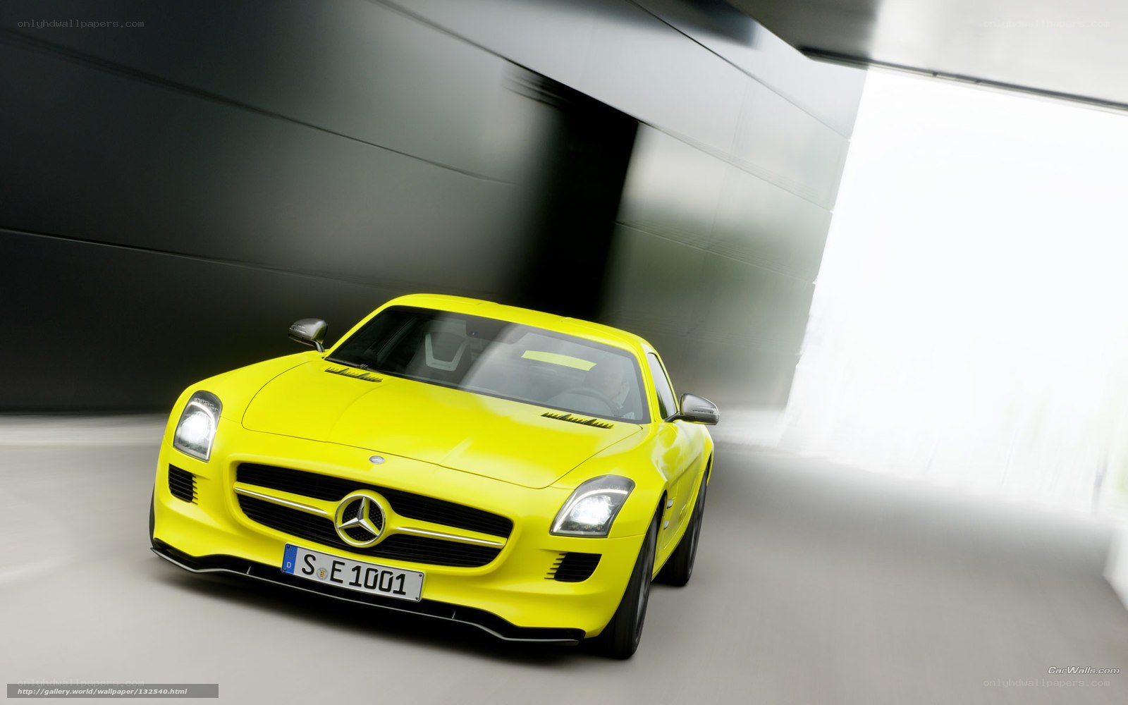 yellow mercedes-benz sports car