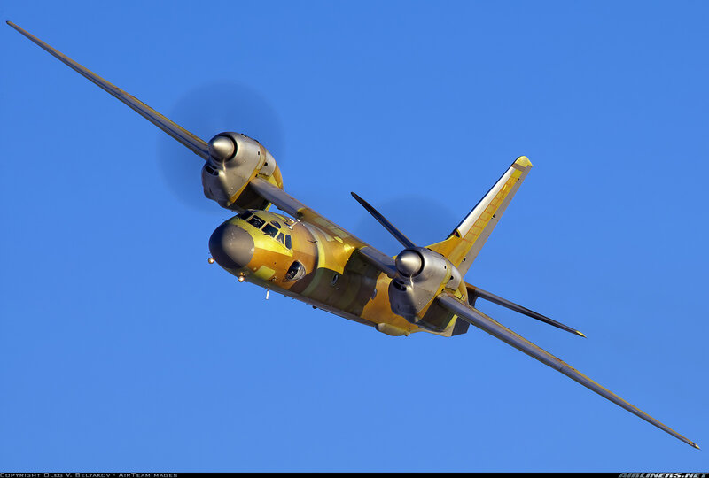 yellow military transport plane