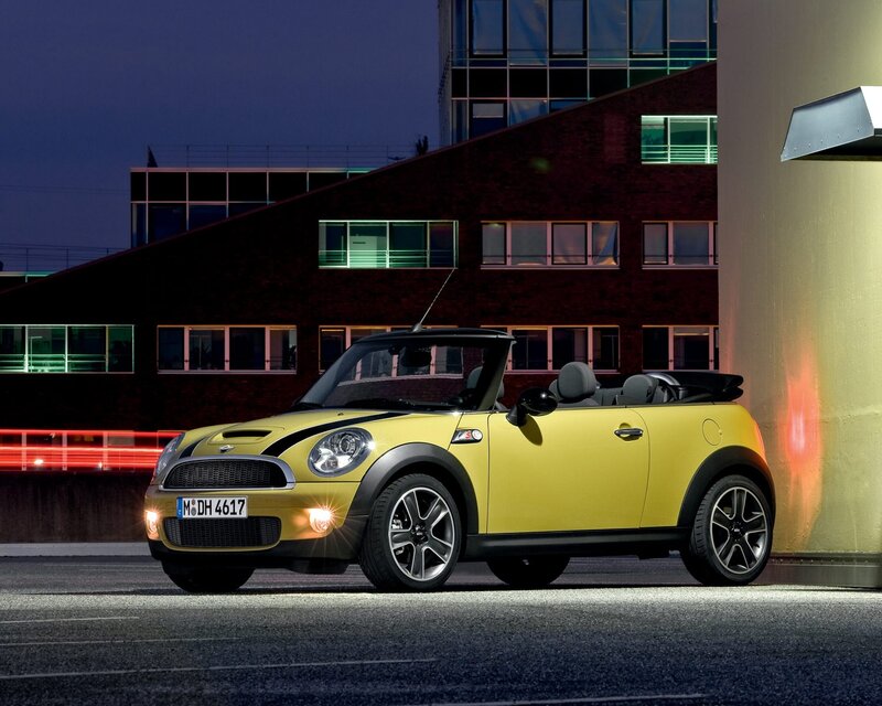 Yellow MINI convertible at night