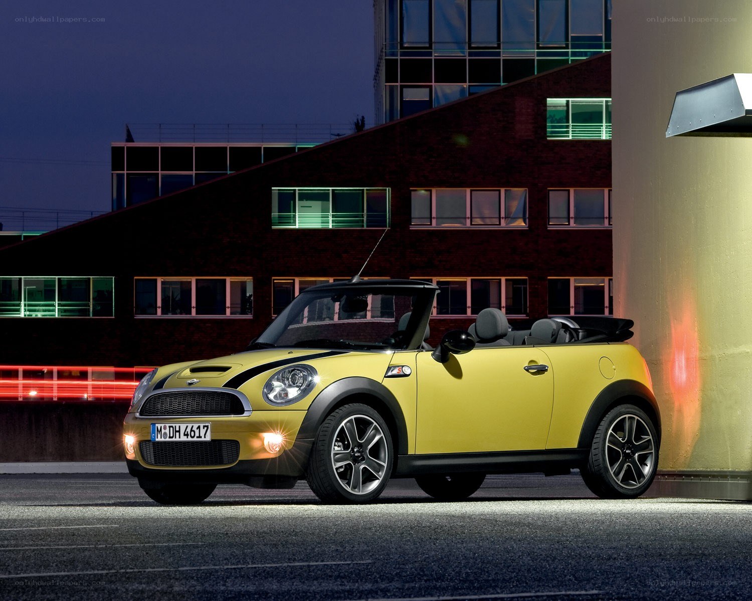 Yellow MINI convertible at night