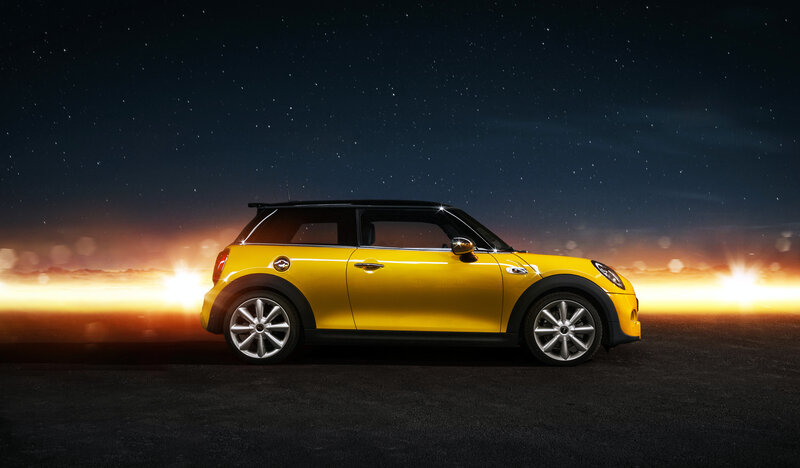 Yellow MINI Cooper at night