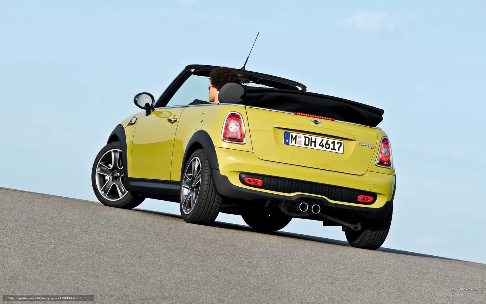 yellow mini cooper convertible