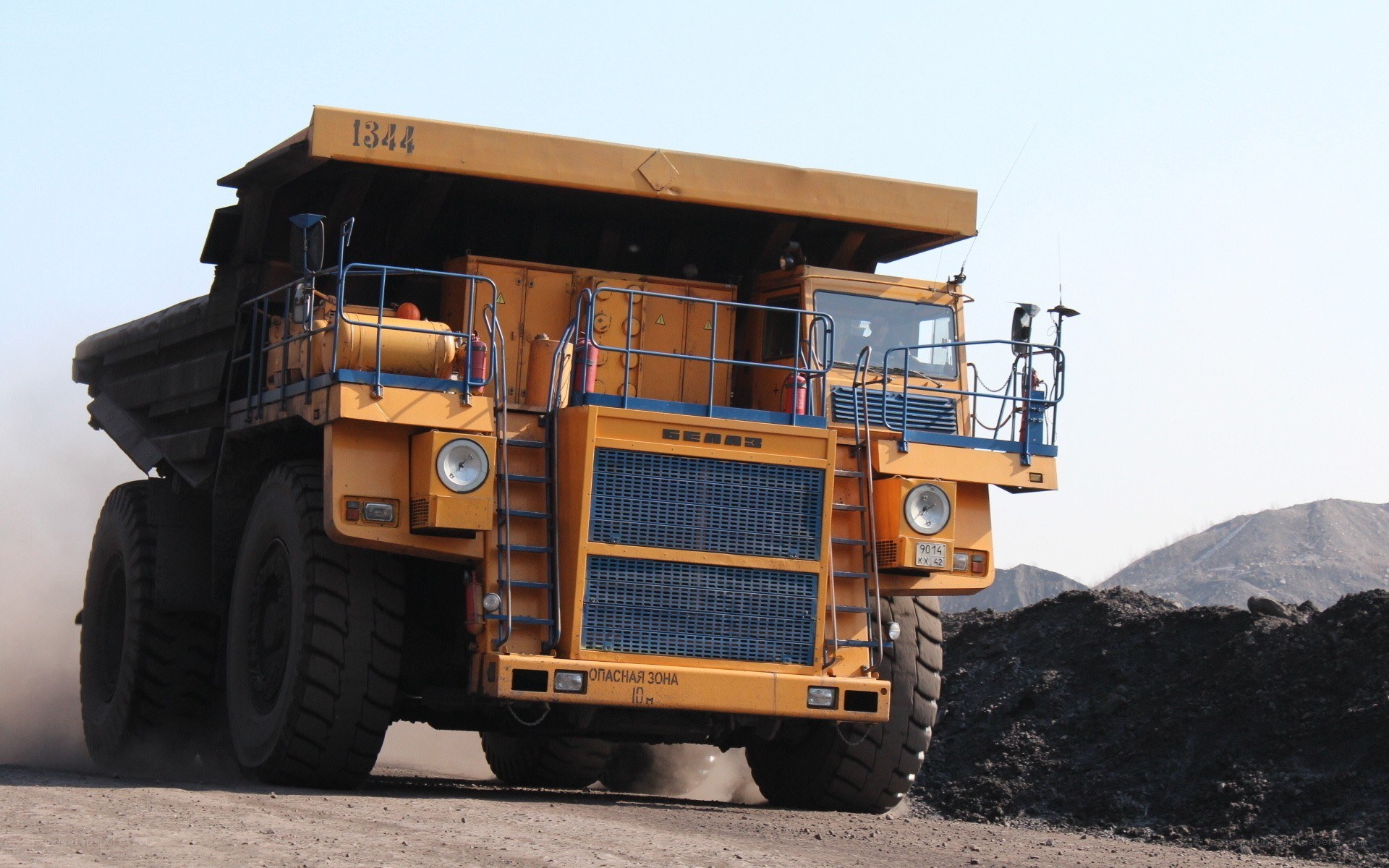 Yellow mining truck at work