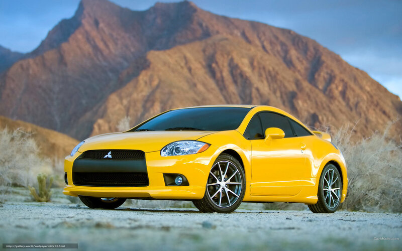 Yellow Mitsubishi Eclipse in desert