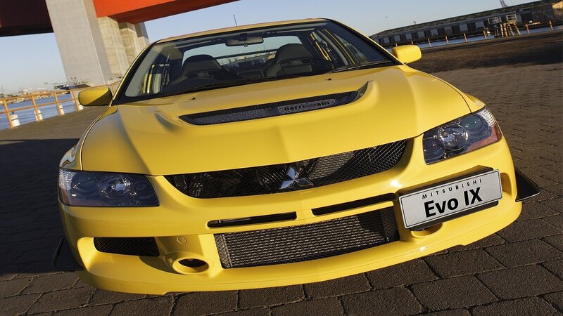 Yellow Mitsubishi Evo IX car
