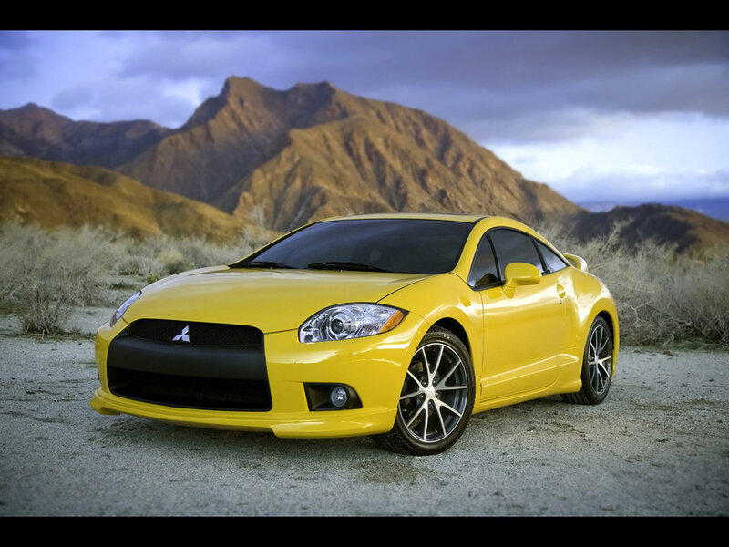 Yellow Mitsubishi sports car in desert