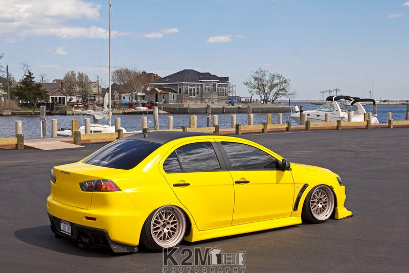 Yellow Modified Sedan — Calm, Afternoon, Photograph, Dock