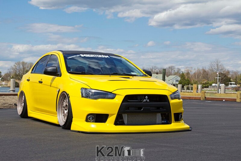 Yellow Modified Sedan — Calm, Afternoon, Photograph
