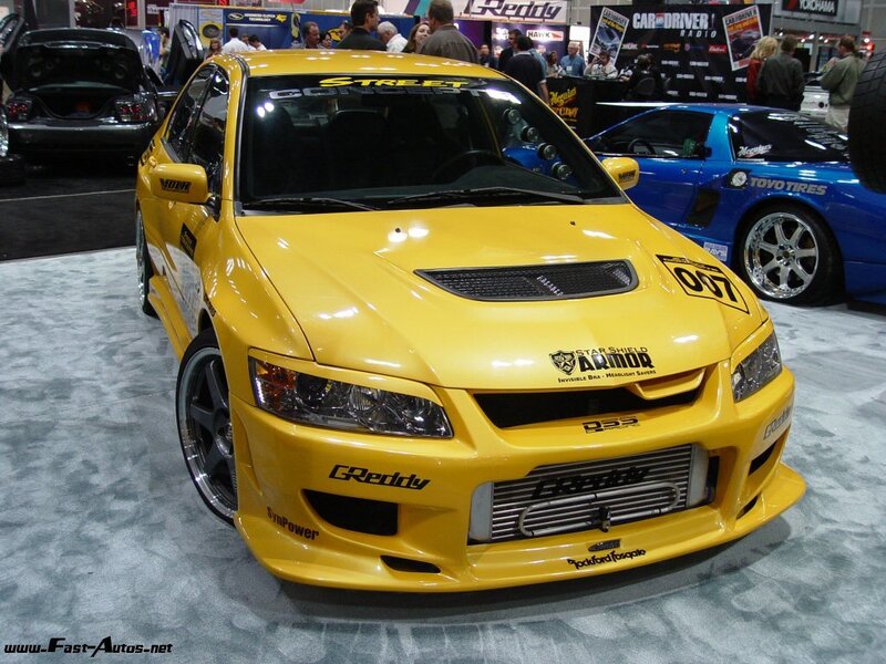 Yellow modified sports car at show