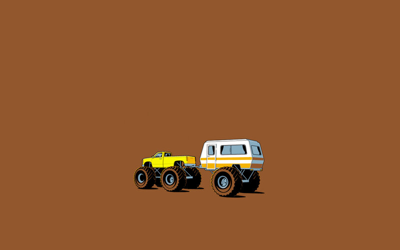 yellow monster truck towing camper