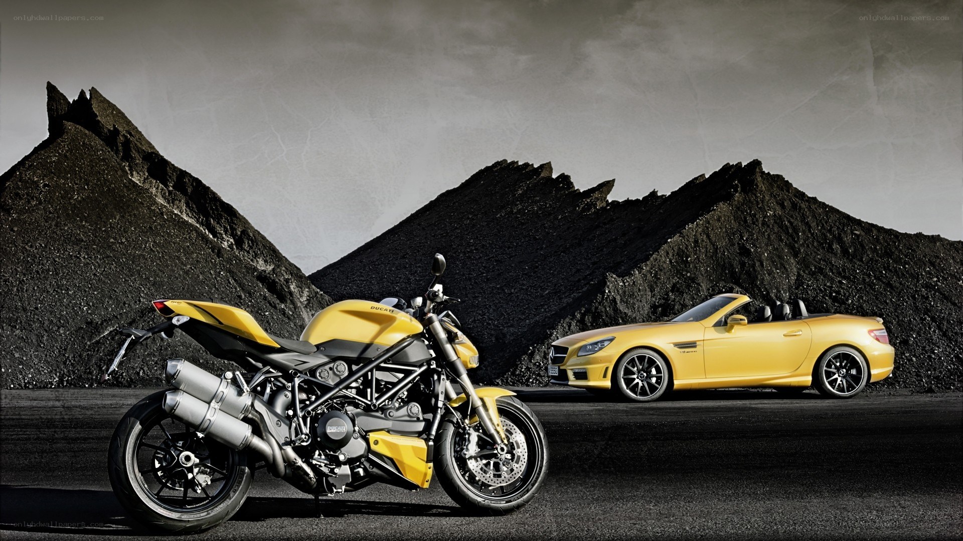 Yellow motorcycle and car