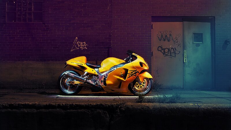 yellow motorcycle in alley