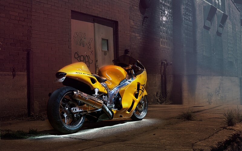 yellow motorcycle in alley