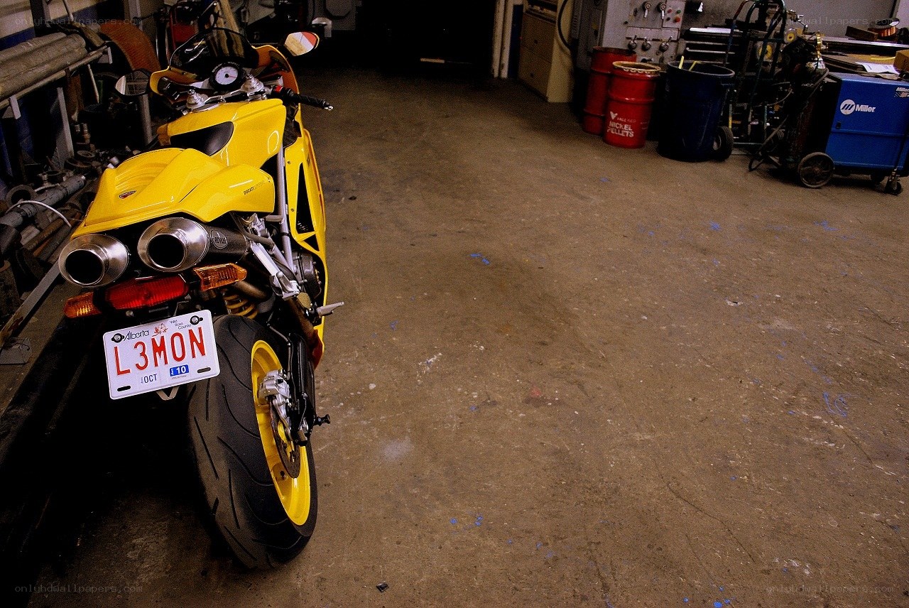 Yellow motorcycle in garage