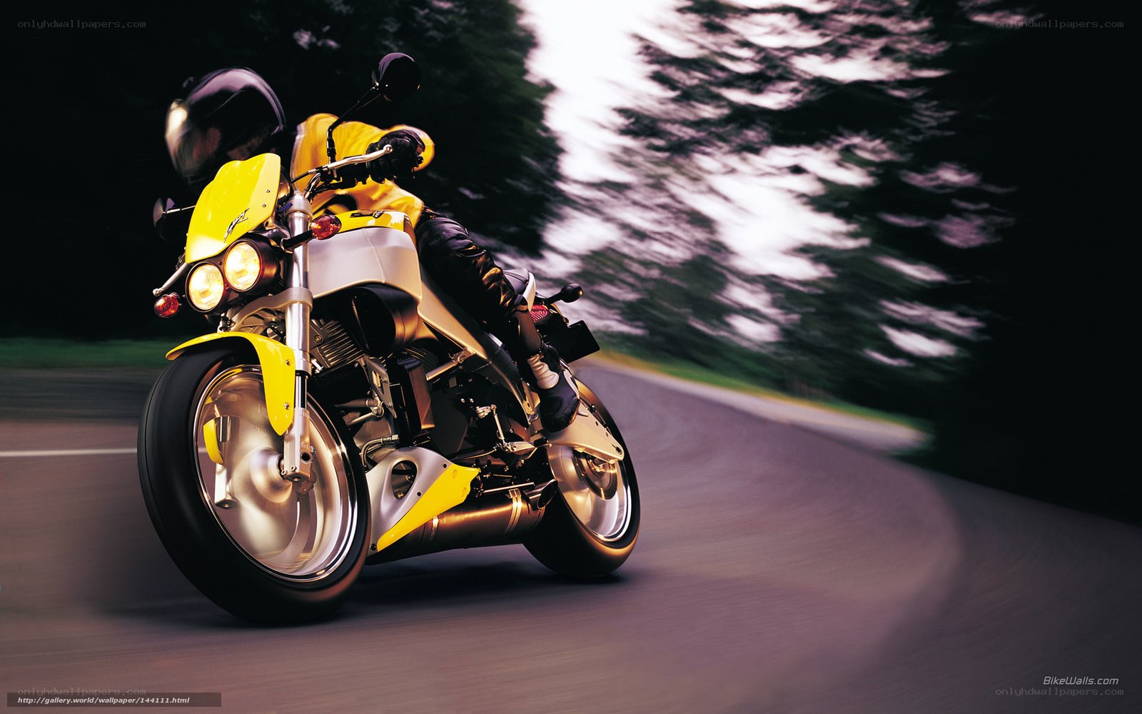 Yellow motorcycle in motion