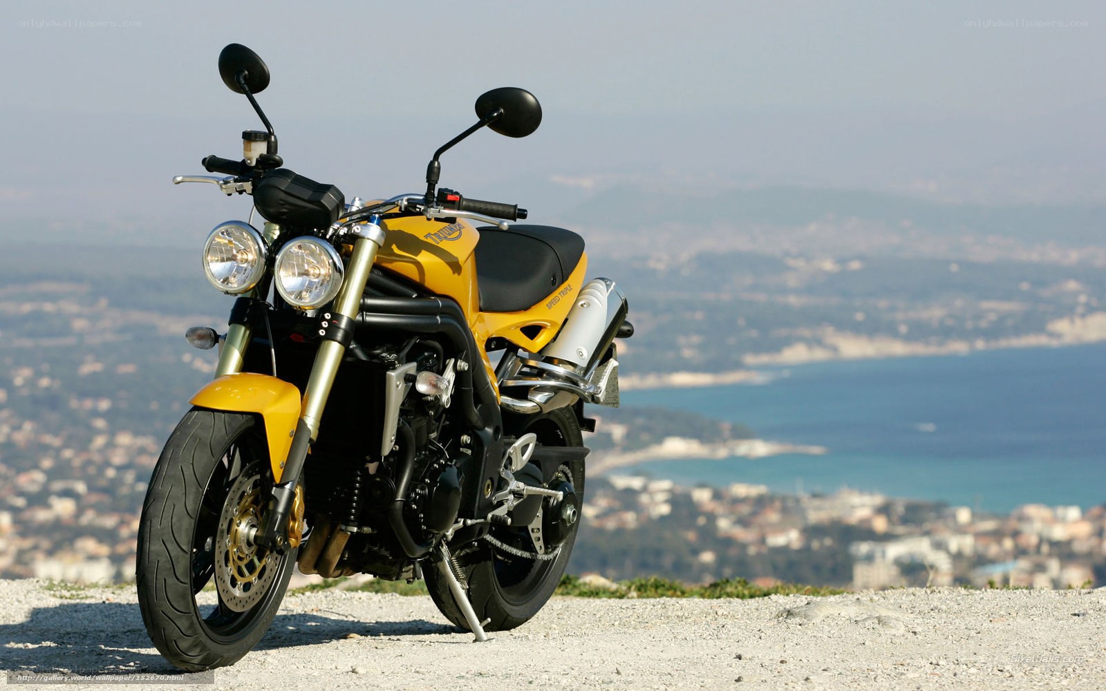 Yellow motorcycle on a hillside