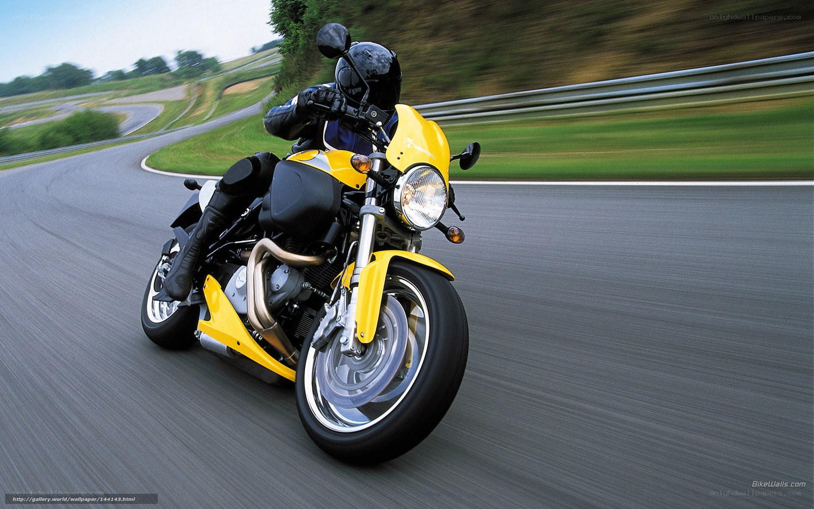 Yellow motorcycle on a racetrack
