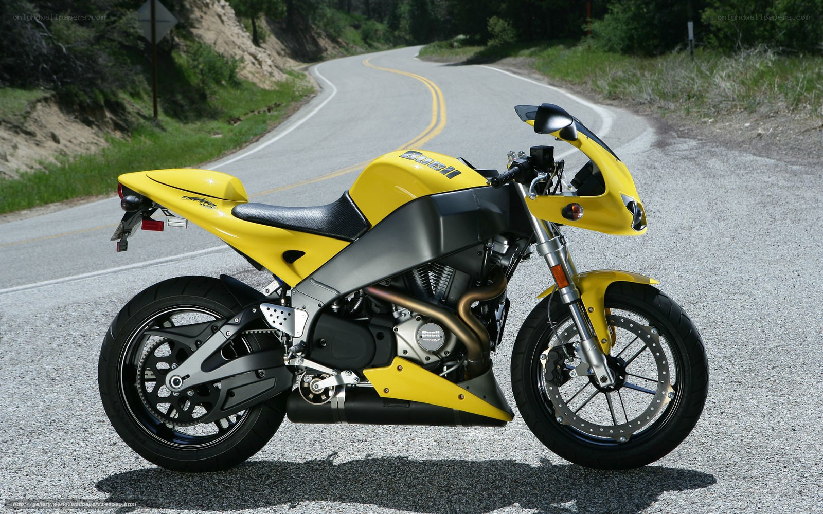 Yellow motorcycle on a winding road