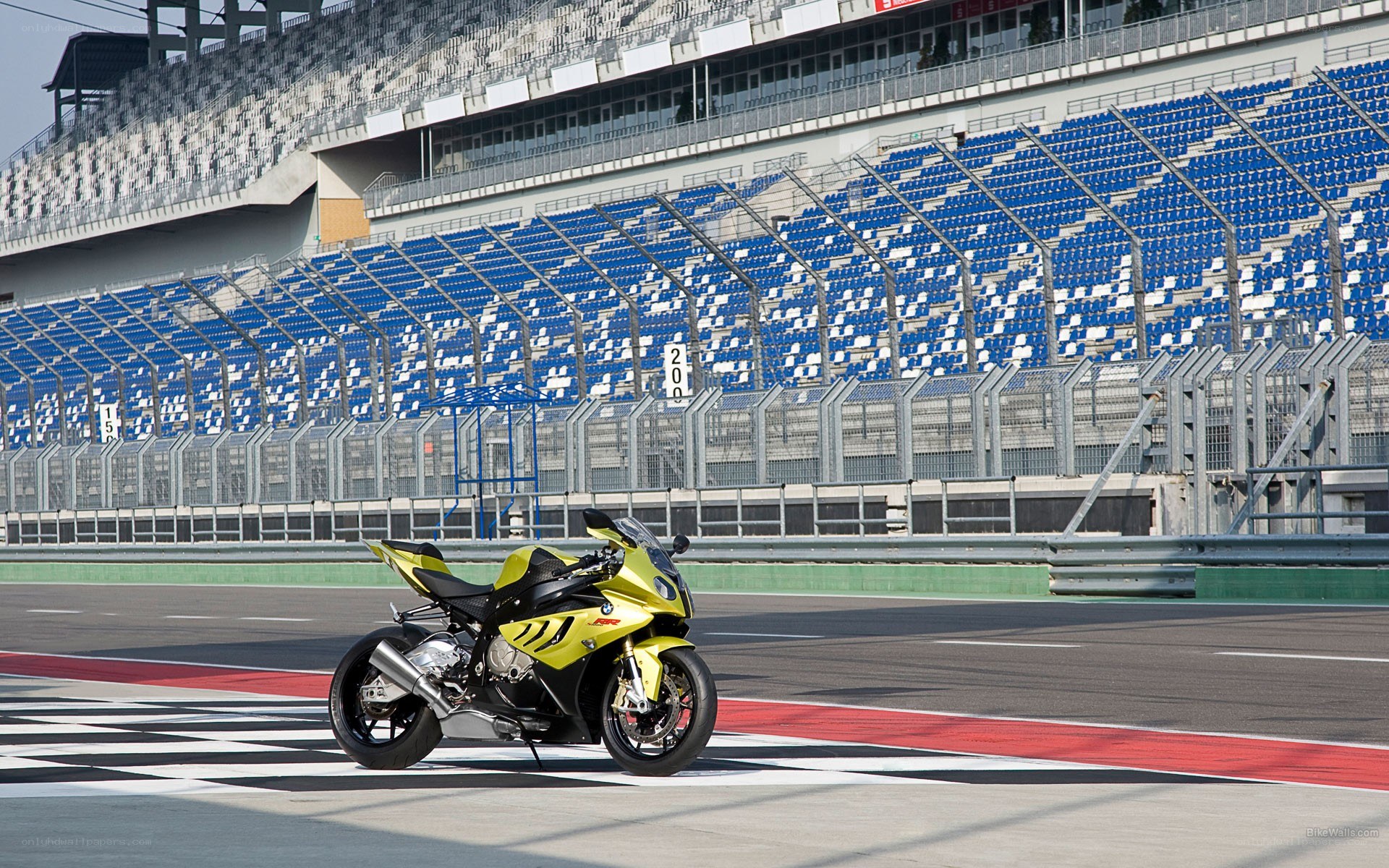 Yellow motorcycle on racetrack