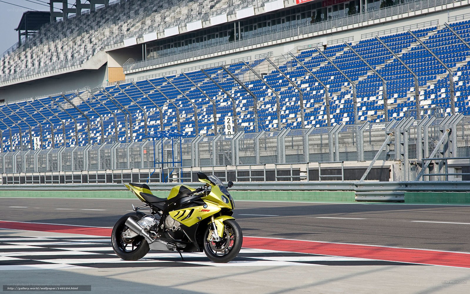 Yellow motorcycle on racetrack
