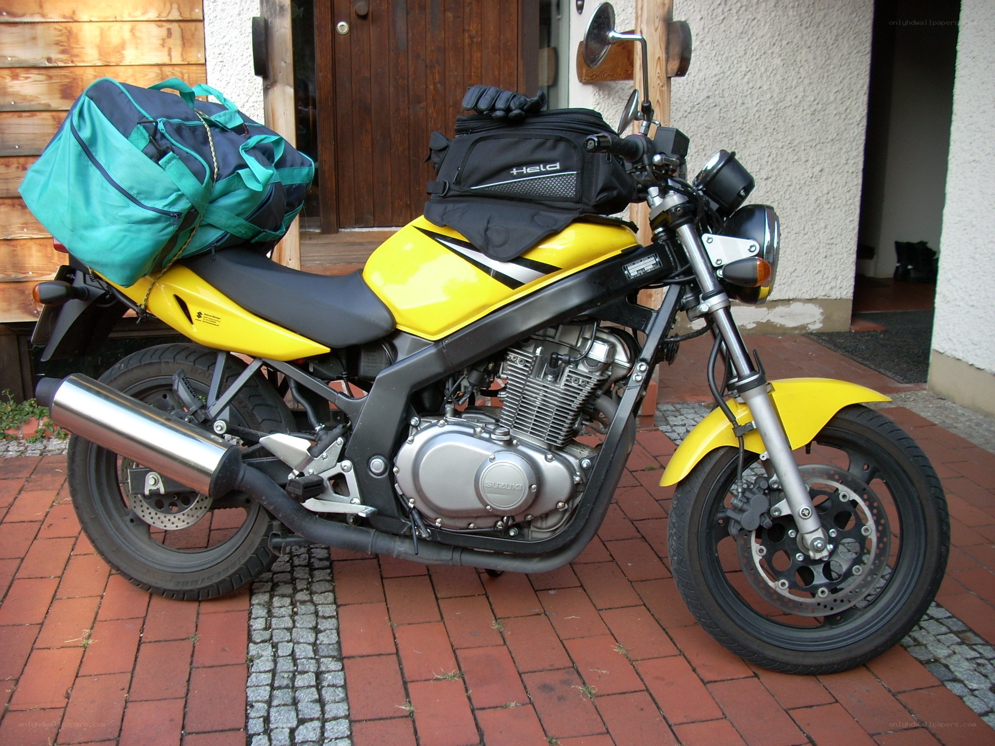 yellow motorcycle with luggage