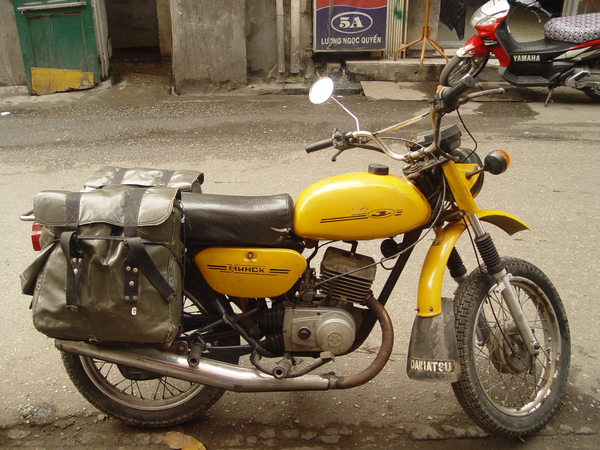 Yellow motorcycle with side bags
