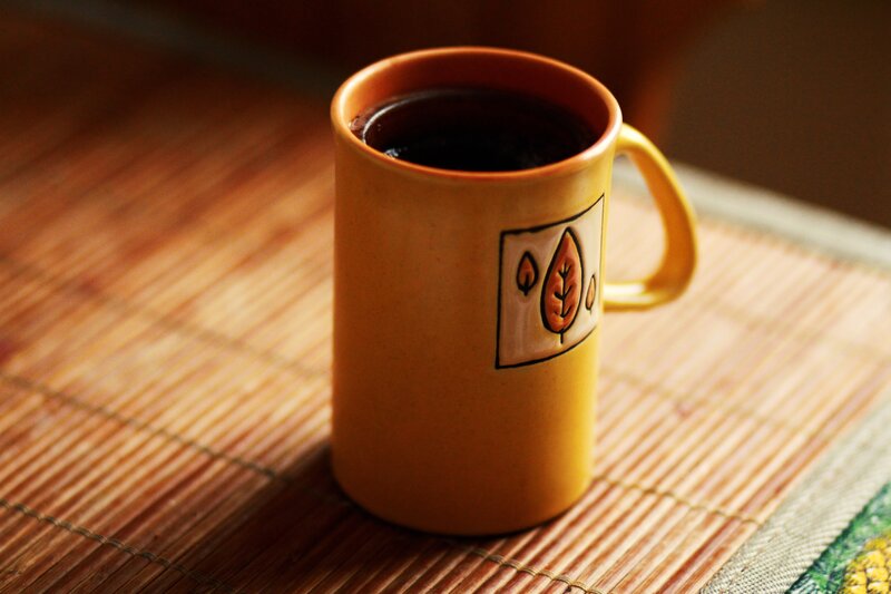 Yellow Mug with Coffee