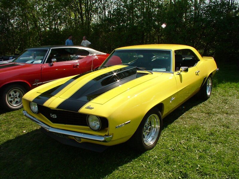 Yellow muscle car at a show