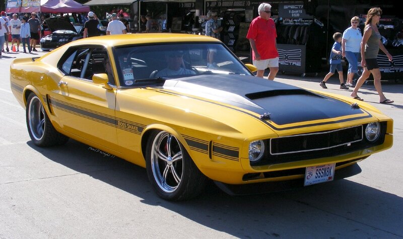Yellow muscle car at a show