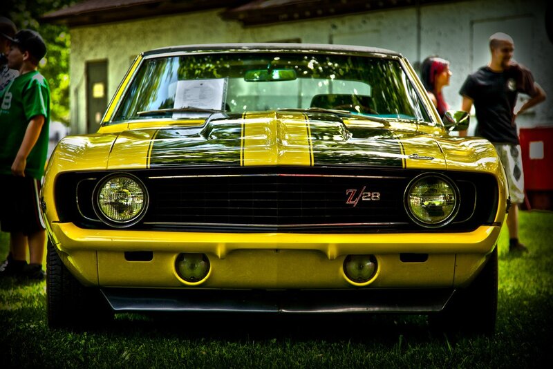 Yellow muscle car at a show