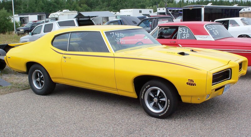 Yellow muscle car at a show