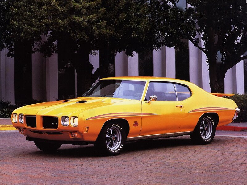 Yellow Muscle Car — Calm, Afternoon, Photograph, Trees, Building