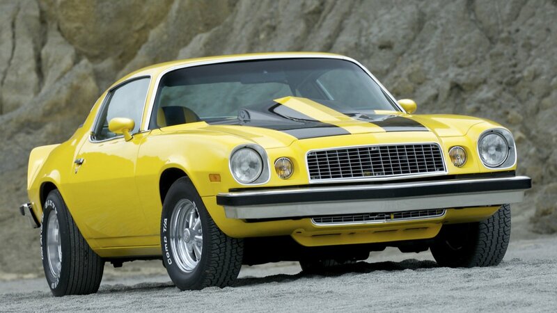 Yellow Muscle Car — Dramatic, Photograph, Rock Wall