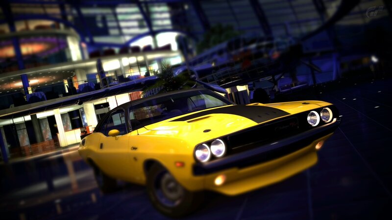Yellow muscle car in a showroom