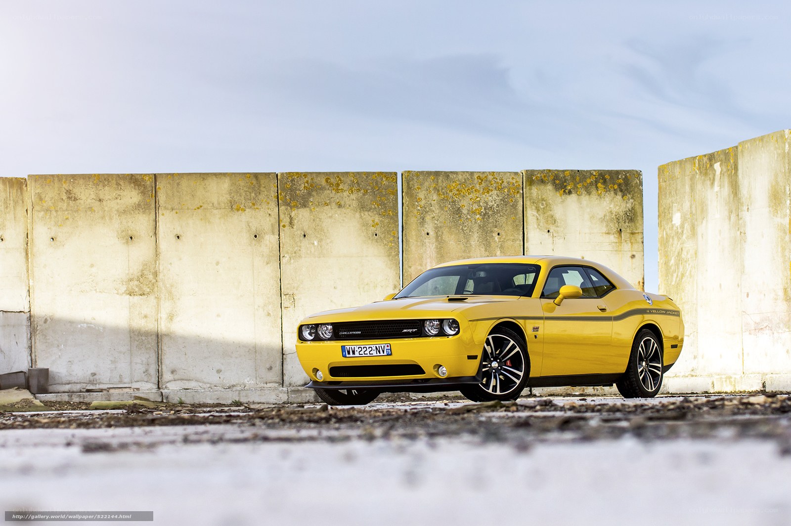 Yellow muscle car in urban setting