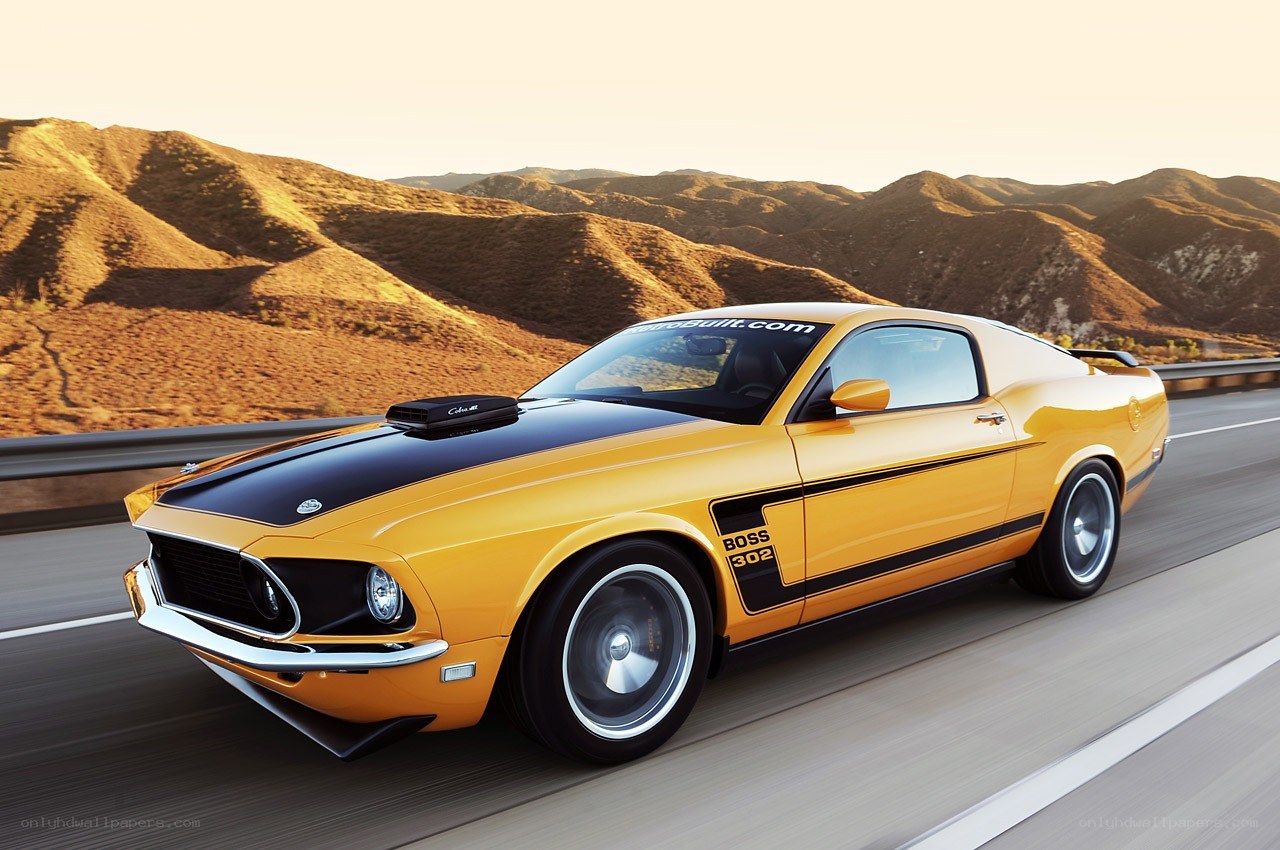 Yellow muscle car on a highway