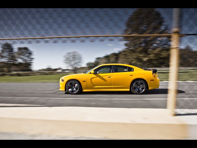 Yellow muscle car on a racetrack