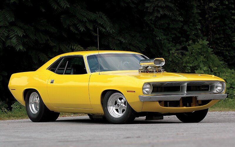 Yellow muscle car with supercharger