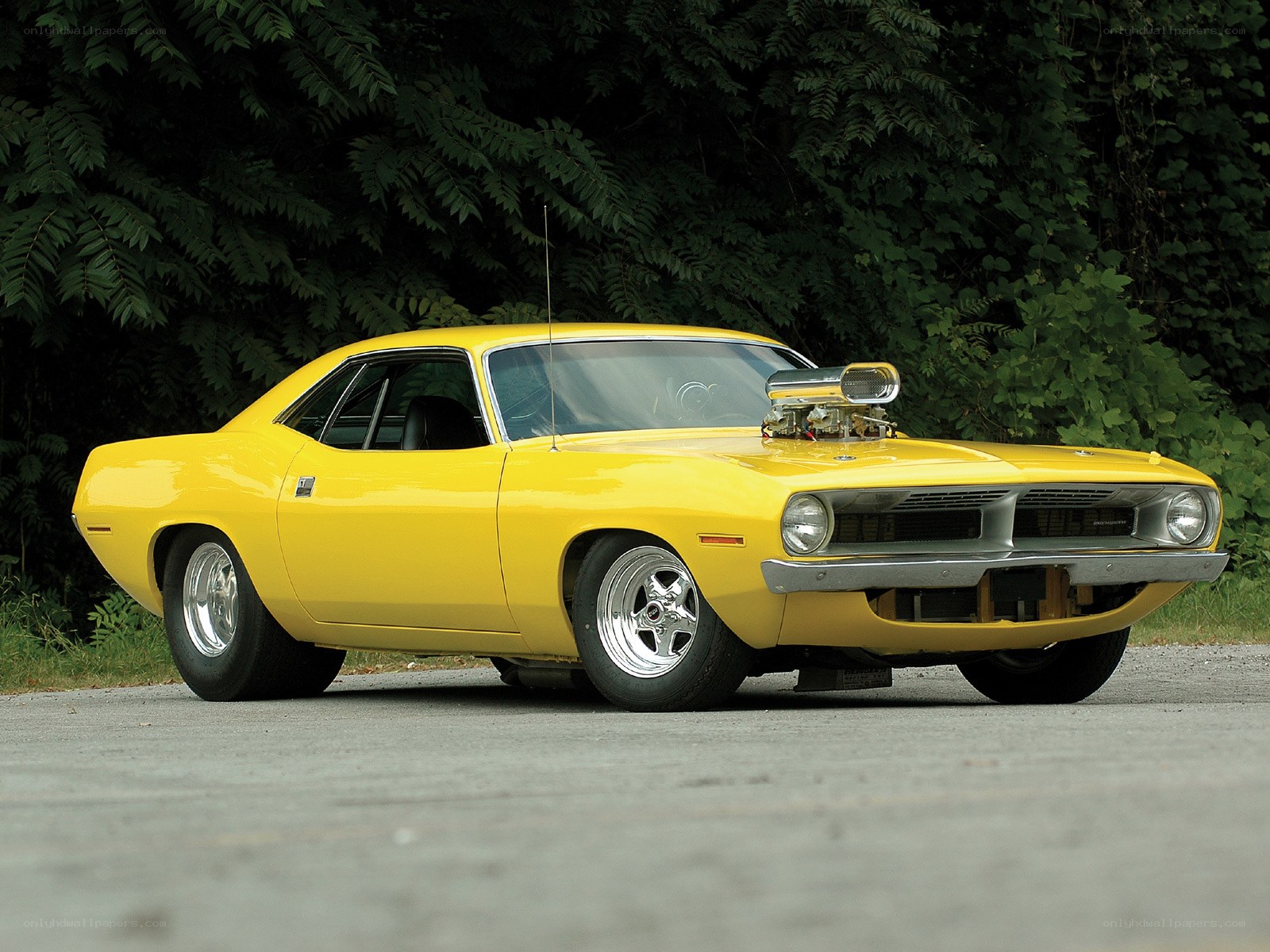Yellow muscle car with supercharger