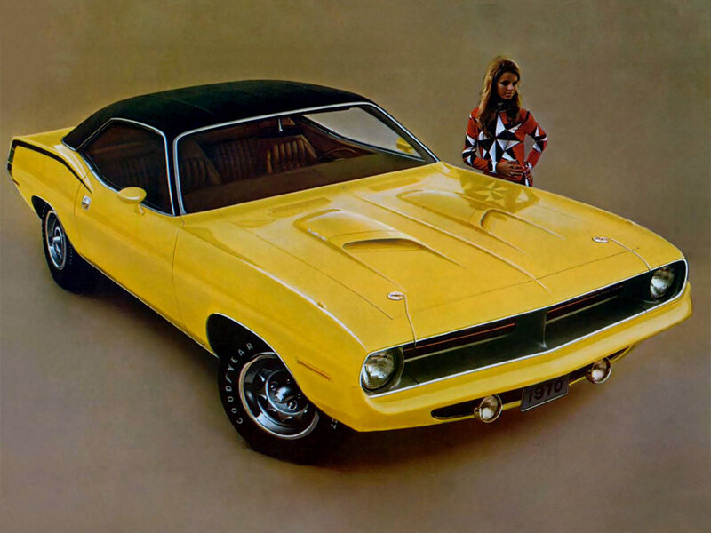 Yellow muscle car with woman